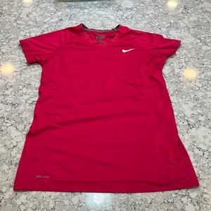 Pink nike pro combat dri fit tee size L. Fitted style. never worn